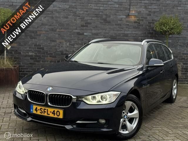 Blauw Gebruikt 2013 BMW 320 Executive Stationwagen | € 8.995 (Goede deal) - Afbeelding 1/4