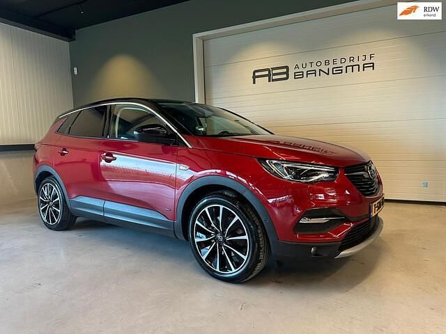 Rood (metallic) Occasion 2021 Opel Grandland X Elegance SUV | € 22.950 (Eerlijke prijs) - Afbeelding 1/4