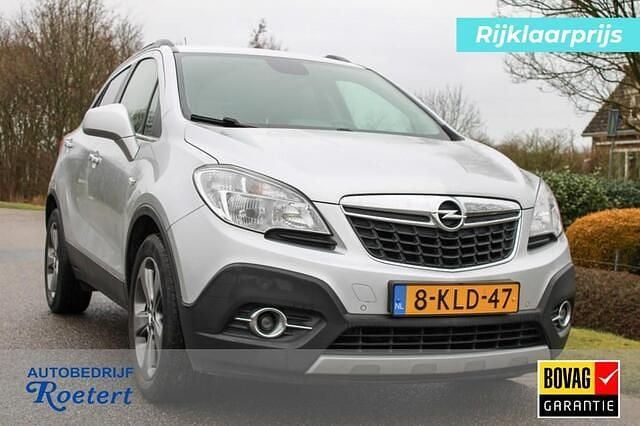 Grijs Gebruikt 2013 Opel Mokka Cosmo SUV | € 9.750 (Eerlijke prijs) - Afbeelding 1/4