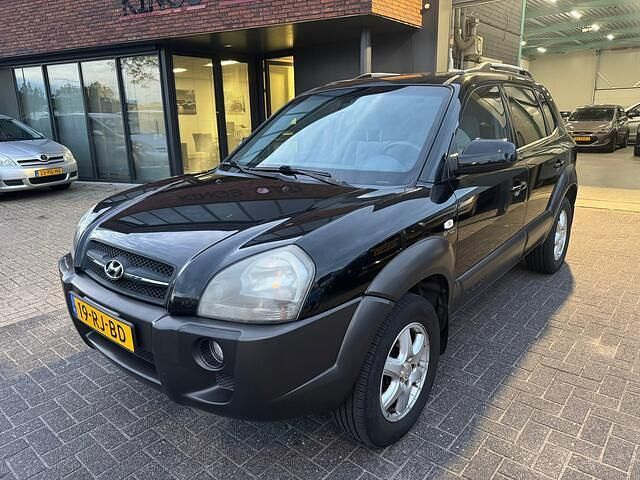 Zwart Gebruikt 2005 Hyundai Tucson Dynamiq SUV | € 3.295 (Eerlijke prijs) - Afbeelding 1/4