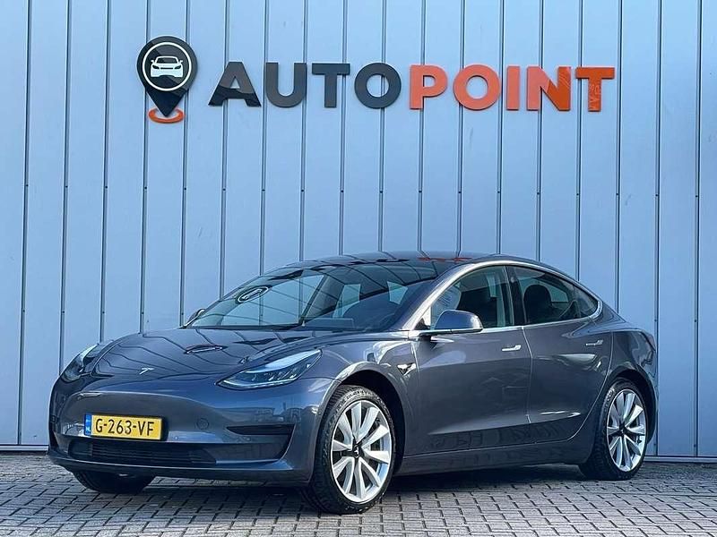 Grijs Occasion 2019 Tesla Model 3 Standard Range Sedan | € 16.787 (Eerlijke prijs) - Afbeelding 1/4