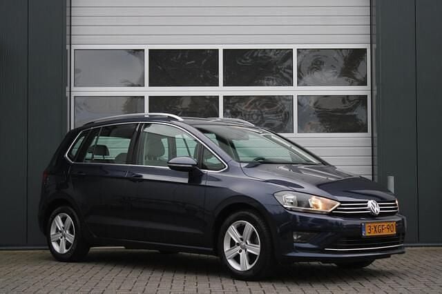 Blauw Gebruikt 2014 VW Golf Sportsvan Highline MPV | € 13.950 (Eerlijke prijs) - Afbeelding 1/4