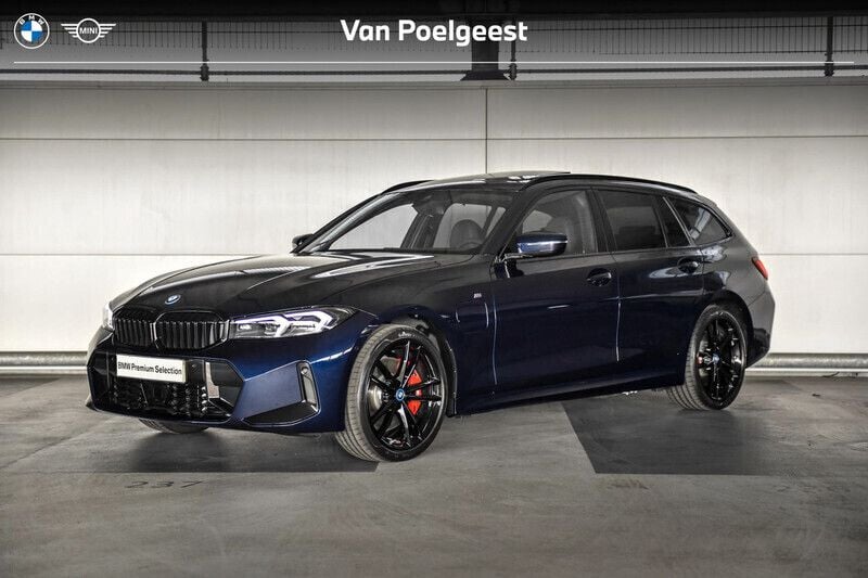 Bmw individual tansanit metallic (blauw metallic) Gebruikt 2024 BMW 330e M Sport Stationwagen | € 52.900 (Goede deal) - Afbeelding 1/4