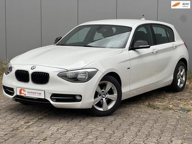 Wit Gebruikt 2012 BMW 116 Sport Line Hatchback | € 10.945 (Iets duurder) - Afbeelding 1/4