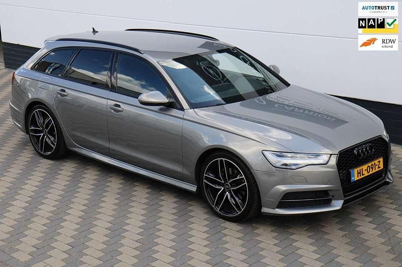 Grijs Gebruikt 2015 Audi A6 Sport Stationwagen | € 18.945 - Afbeelding 1/4