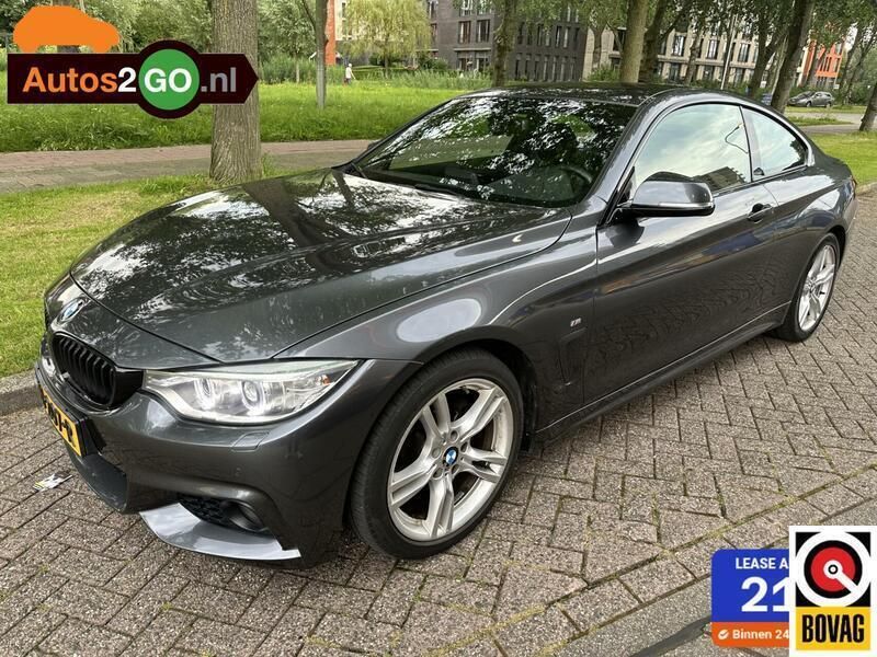 Grijs, metallic lak Gebruikt 2015 BMW 420 Executive Coupé | € 12.995 (Goede deal) - Afbeelding 1/4