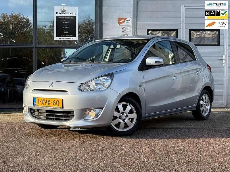 Grijs (metallic) Gebruikt 2014 Mitsubishi Space Star Intense Hatchback | € 5.499 (Eerlijke prijs) - Afbeelding 1/4