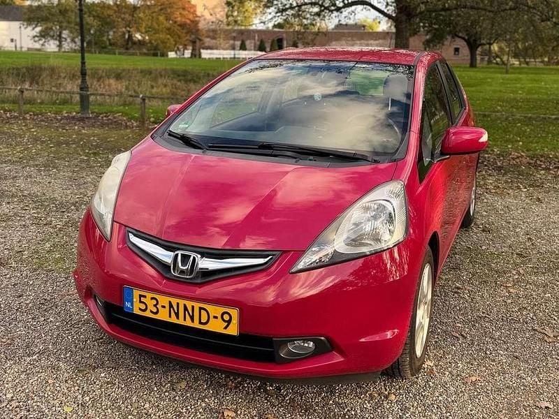 Rood Gebruikt 2010 Honda Jazz Comfort Hatchback | € 7.500 (Eerlijke prijs) - Afbeelding 1/4