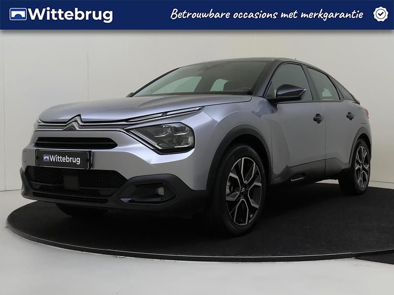 Grijs (metallic) Occasion 2023 Citroën e-C4 Feel SUV | € 20.450 (Eerlijke prijs) - Afbeelding 1/3