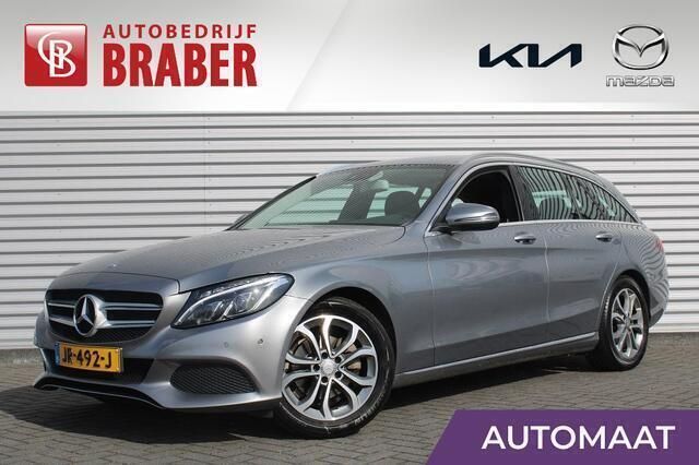 Grijs, metallic lak Gebruikt 2016 Mercedes C180 Ambition Stationwagen | € 27.850 - Afbeelding 1/4