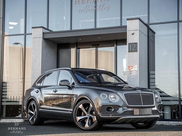 Grijs (metallic) Gebruikt 2020 Bentley Bentayga SUV | € 104.950 - Afbeelding 1/4