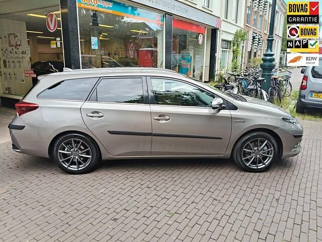 Bruin Gebruikt 2015 Toyota Auris Touring Sports Stationwagen | € 14.950 (Iets duurder) - Afbeelding 1/4