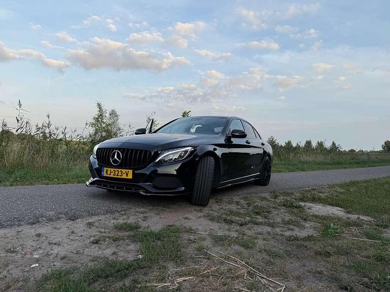 Zwart Occasion 2016 Mercedes C400 Prestige Sedan | € 21.000 - Afbeelding 1/4