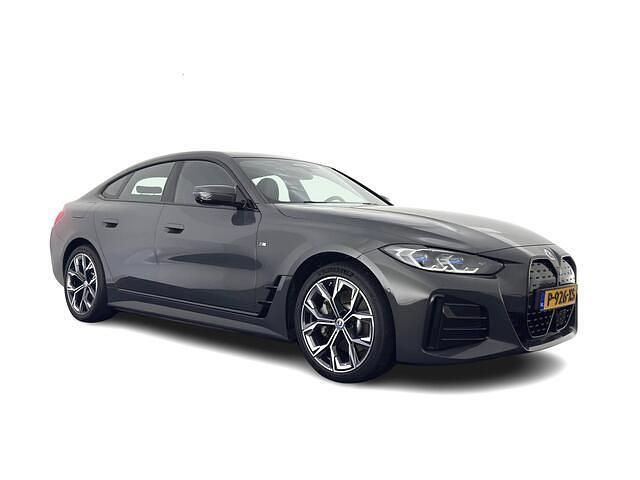 Grijs (parellak) Gebruikt 2022 BMW i4 Executive Sedan | € 28.445 - Afbeelding 1/4