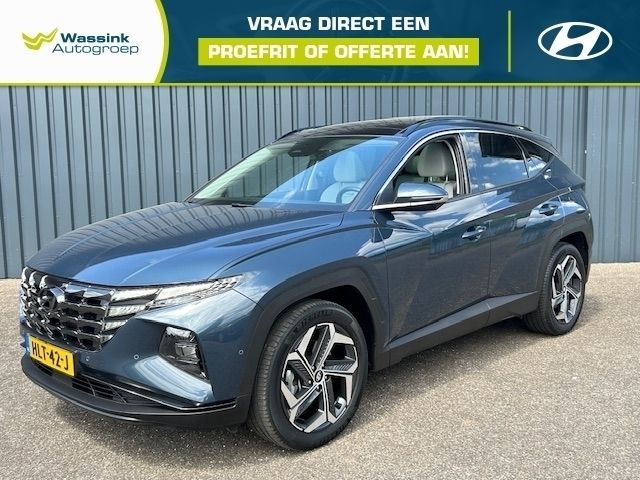 Teal blue (blauw metallic) Gebruikt 2021 Hyundai Tucson Premium SUV | € 32.205 (Eerlijke prijs) - Afbeelding 1/4
