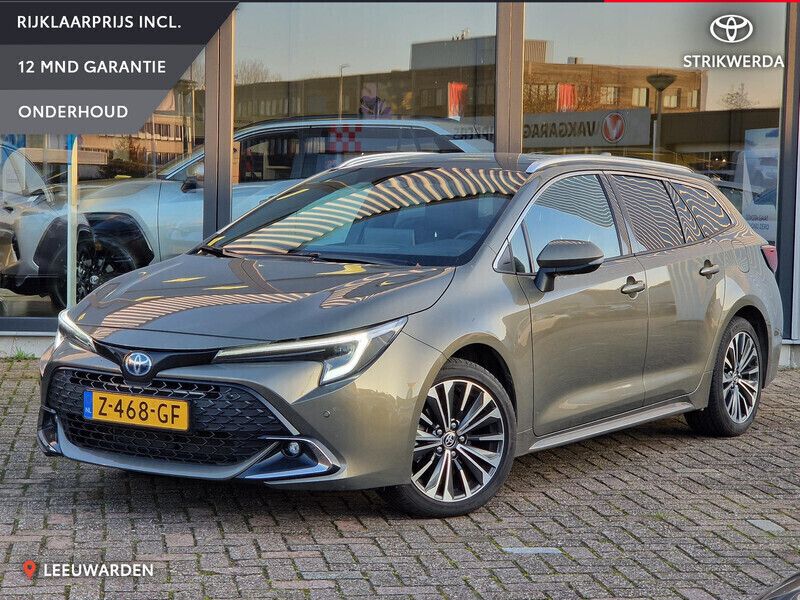 Groen Gebruikt 2024 Toyota Corolla Hybrid Stationwagen | € 32.950 - Afbeelding 1/4