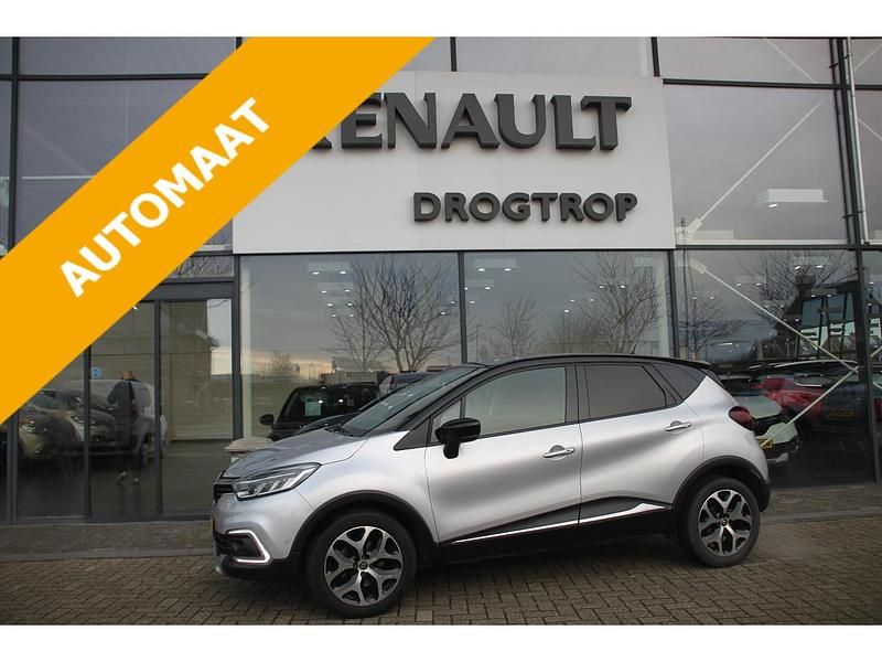 Gris highlandzwart dak (grijs metallic) Gebruikt 2018 Renault Captur Dynamique SUV | € 15.425 (Eerlijke prijs) - Afbeelding 1/4