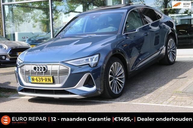 Blauw, metallic lak Gebruikt 2021 Audi e-tron Sportback S-Line SUV | € 32.995 - Afbeelding 1/4