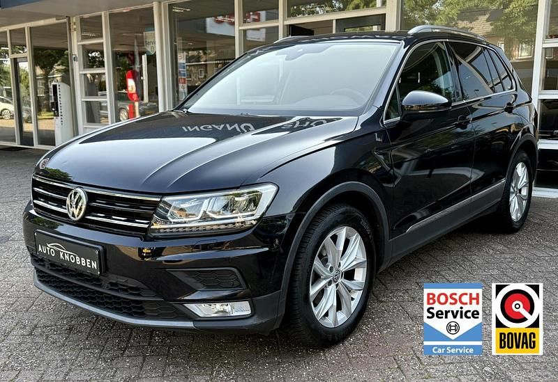 Zwart, metallic lak Gebruikt 2016 VW Tiguan Highline SUV | € 17.400 (Eerlijke prijs) - Afbeelding 1/4