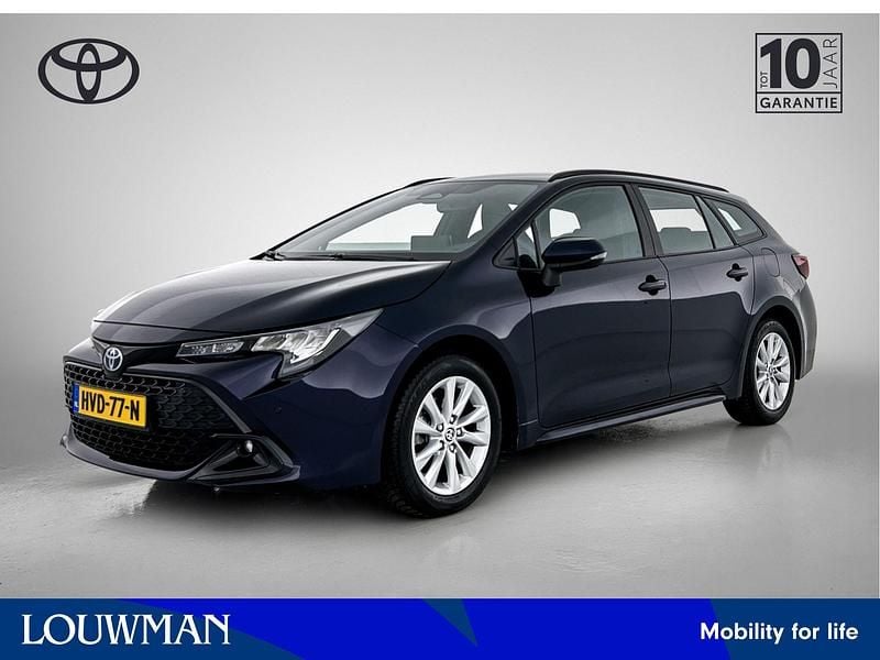 Blauw Gebruikt 2024 Toyota Corolla Hybrid Stationwagen | € 28.795 - Afbeelding 1/3