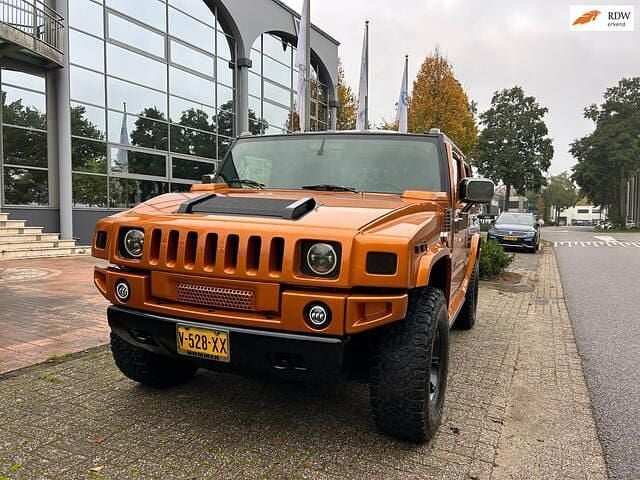 Oranje Gebruikt 2006 Hummer H2 SUV | € 29.000 - Afbeelding 1/4