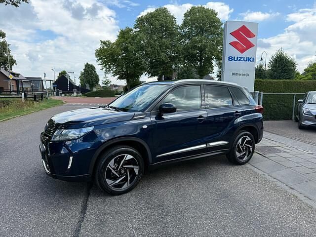 Blauw Gebruikt 2024 Suzuki Vitara SUV | € 26.995 (Eerlijke prijs) - Afbeelding 1/4