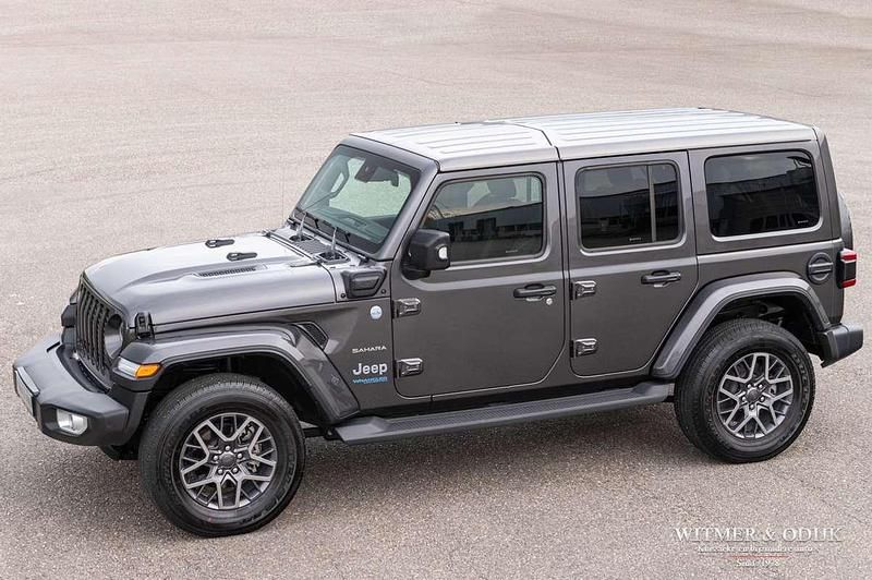 Grijs, metallic lak Gebruikt 2021 Jeep Wrangler Unlimited Sahara SUV | € 52.950 - Afbeelding 1/4