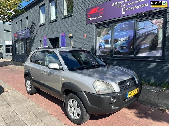 Grijs Occasion 2006 Hyundai Tucson Dynamiq SUV | € 2.899 (Eerlijke prijs) - Afbeelding 1/4