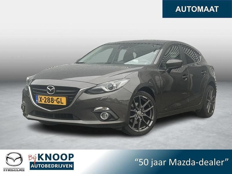 Titanium flash mica (42s) Gebruikt 2016 Mazda 3 Hatchback | € 16.900 (Eerlijke prijs) - Afbeelding 1/4