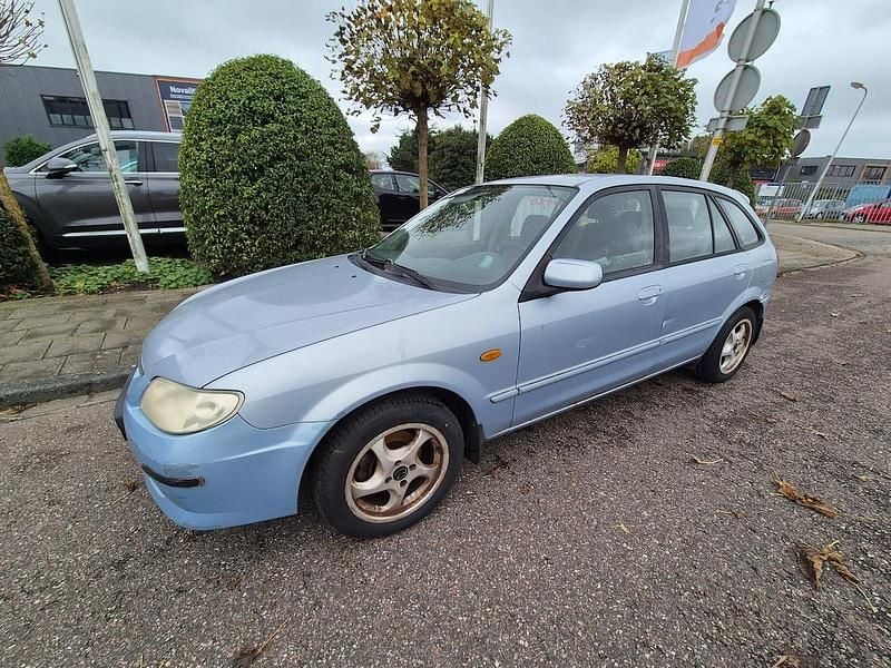 Blauw Gebruikt 2002 Mazda 323 Touring Hatchback | € 950 (Goede deal) - Afbeelding 1/4