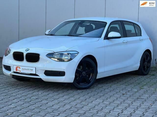 Wit Gebruikt 2012 BMW 116 Hatchback | € 10.945 (Duur) - Afbeelding 1/4