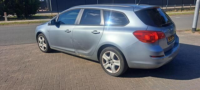 Occasion Opel Astra Selection 101 PK (74 kW) 2011 Grijs Stationwagen
