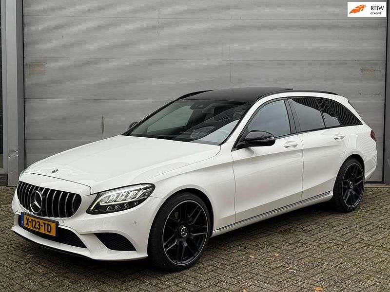 Wit (metallic) Occasion 2018 Mercedes C200 Premium Plus Stationwagen | € 18.949 (Goede deal) - Afbeelding 1/4
