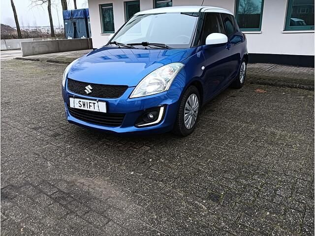 Blauw Occasion 2015 Suzuki Swift Hatchback | € 7.850 (Eerlijke prijs) - Afbeelding 1/4