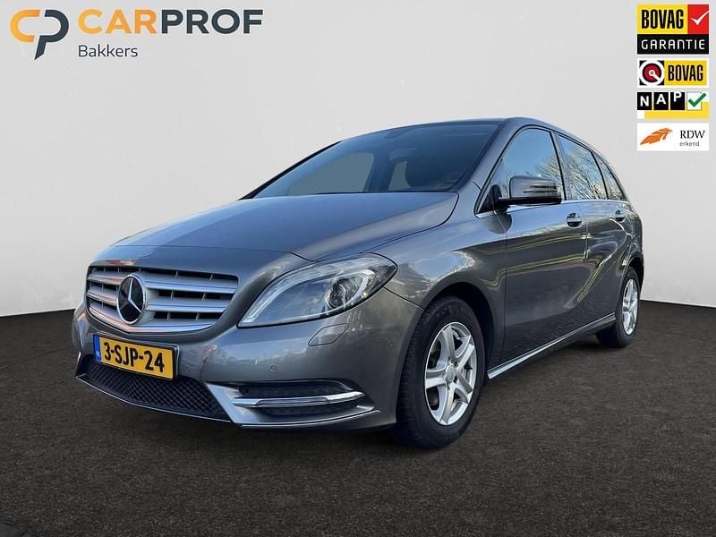 Grijs (metallic) Gebruikt 2013 Mercedes B180 Ambition MPV | € 10.950 (Eerlijke prijs) - Afbeelding 1/4