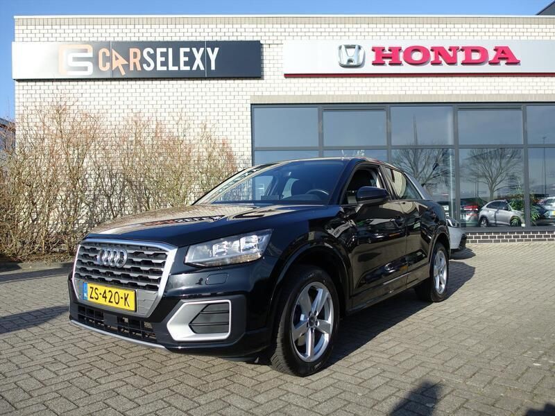 Zwart Gebruikt 2018 Audi Q2 Design SUV | € 17.950 (Eerlijke prijs) - Afbeelding 1/4