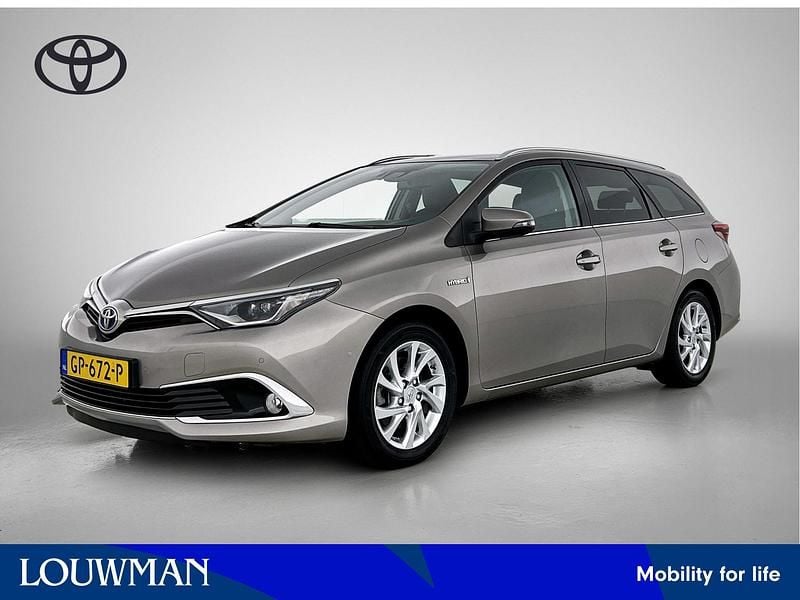 Bruin Gebruikt 2015 Toyota Auris Hybrid Stationwagen | € 15.445 (Eerlijke prijs) - Afbeelding 1/4