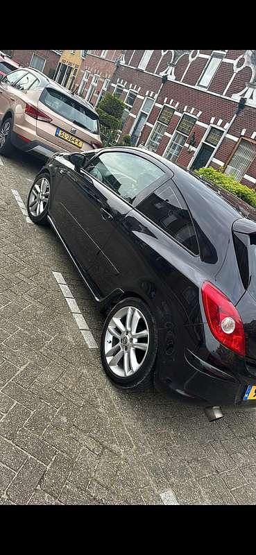 Zwart Gebruikt 2007 Opel Corsa Cosmo Coupé | € 1.500 - Afbeelding 1/2