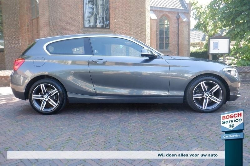 Grijs Gebruikt 2016 BMW 118 Basis Hatchback | € 12.900 (Eerlijke prijs) - Afbeelding 1/4