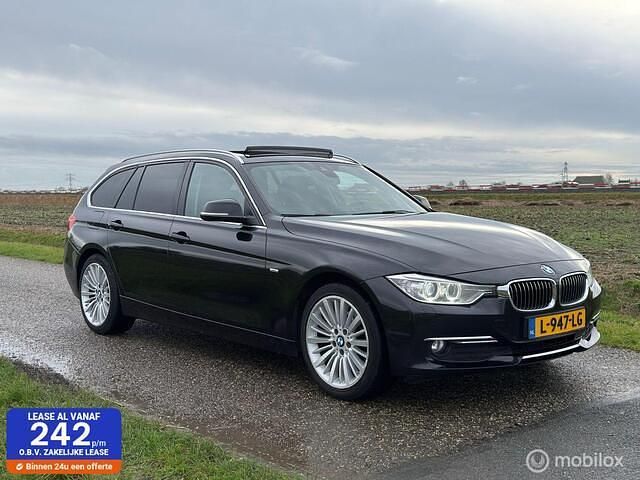 Zwart Gebruikt 2015 BMW 320 Executive Stationwagen | € 14.950 (Super prijs) - Afbeelding 1/4