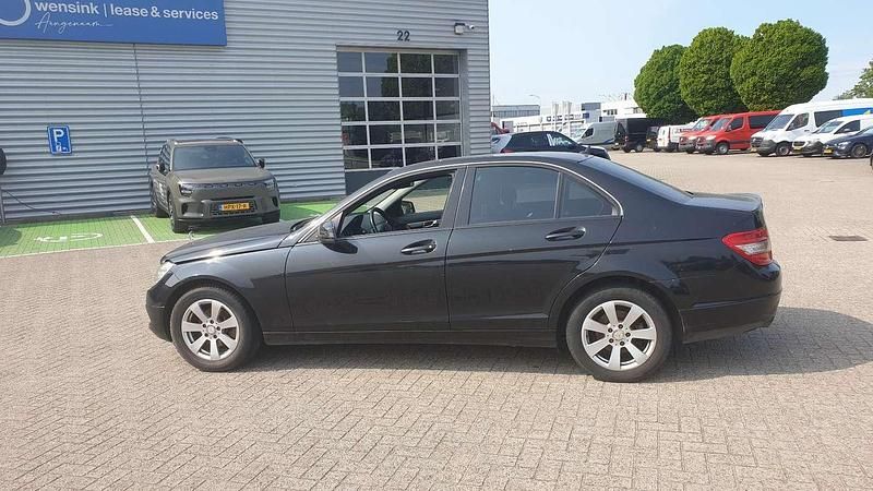 Zwart Gebruikt 2009 Mercedes C200 Business Sedan | € 4.495 (Eerlijke prijs) - Afbeelding 1/4