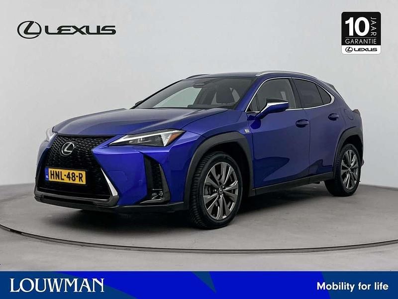 Blauw Gebruikt 2024 Lexus UX 300h Sport Design Packet SUV | € 42.995 - Afbeelding 1/3