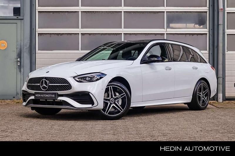 Wit Nieuw 2025 Mercedes C300e AMG line Stationwagen | € 62.505 (Goede deal) - Afbeelding 1/4