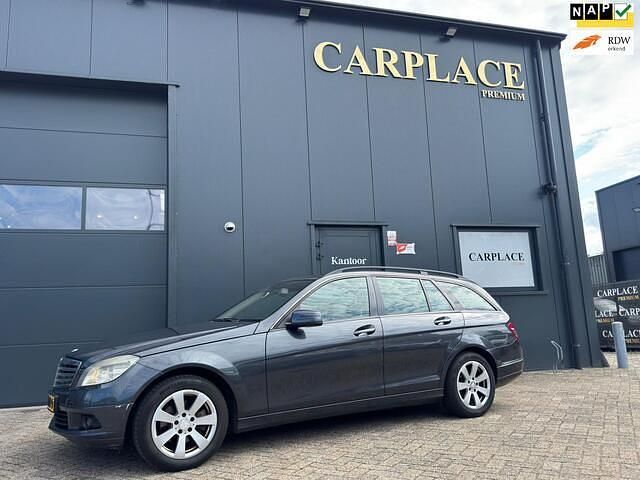 Grijs, metallic lak Gebruikt 2009 Mercedes C200 Business Stationwagen | € 2.750 (Eerlijke prijs) - Afbeelding 1/4