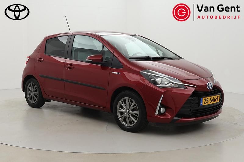 Rood Gebruikt 2019 Toyota Yaris Hybrid Hatchback | € 15.499 (Eerlijke prijs) - Afbeelding 1/4