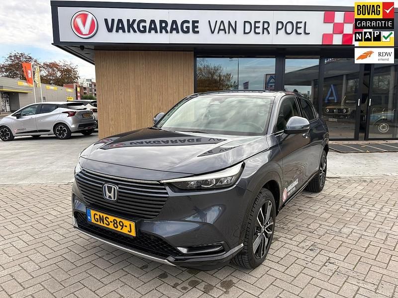 Grijs (metallic) Gebruikt 2024 Honda HR-V Advance SUV | € 34.950 (Eerlijke prijs) - Afbeelding 1/4