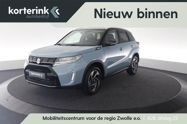 Blauw Nieuw 2024 Suzuki Vitara Style SUV | € 35.094 (Eerlijke prijs) - Afbeelding 1/4