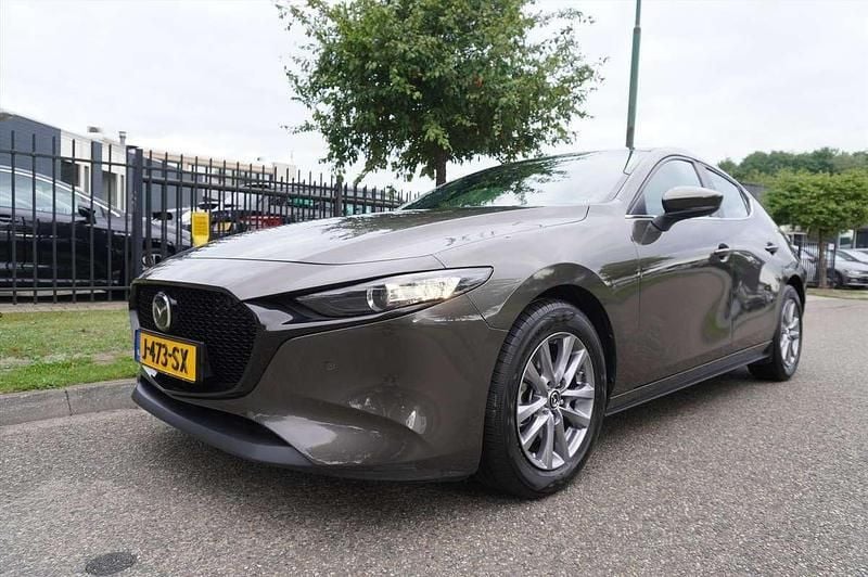 Bruin Gebruikt 2020 Mazda 3 Comfort Hatchback | € 23.945 (Eerlijke prijs) - Afbeelding 1/4