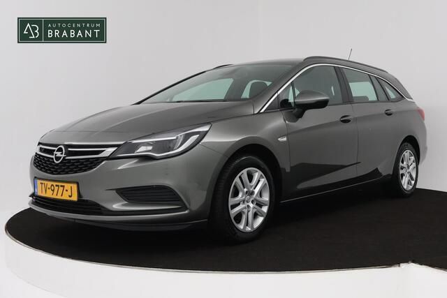 Grijs Gebruikt 2018 Opel Astra Business Stationwagen | € 12.945 (Eerlijke prijs) - Afbeelding 1/4