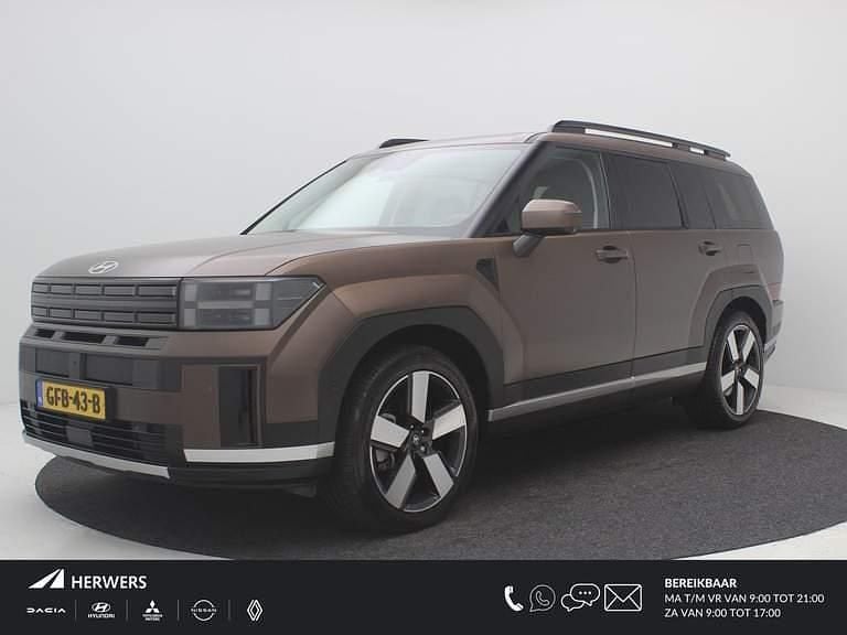 Earthy brass metallic matte (ybm) Gebruikt 2024 Hyundai Santa Fe SUV | € 54.285 - Afbeelding 1/4